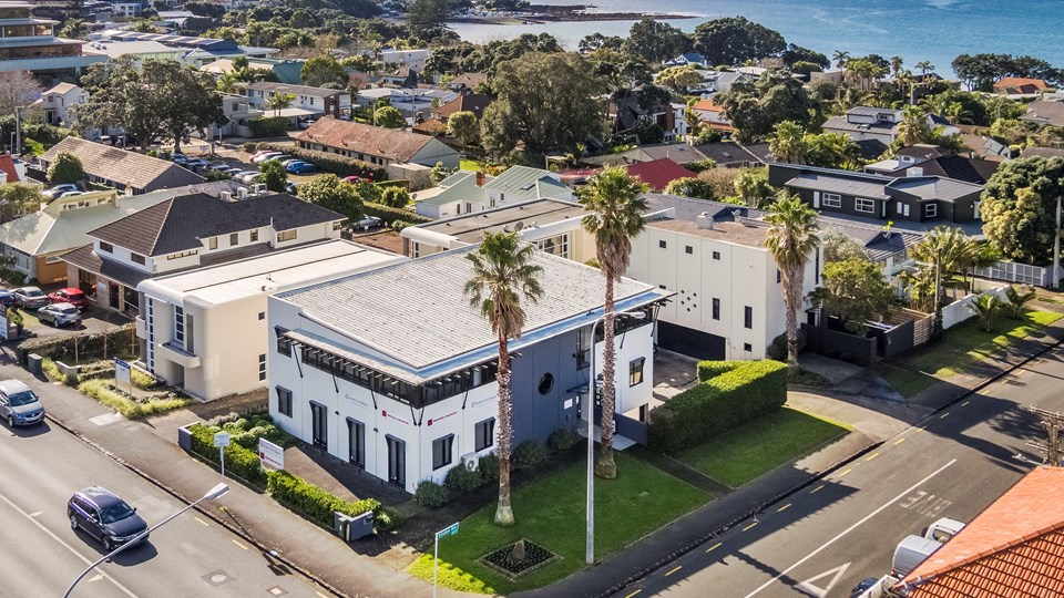 Units A, B, and C at 2 Sanders Ave, Takapuna are identified by the three tall palms. Photo / Supplied
