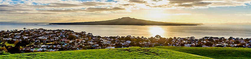 The sun rising behind Rangitoto Island, Auckland New Zealand