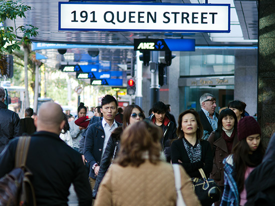 People walking along Queen Street, Auckland